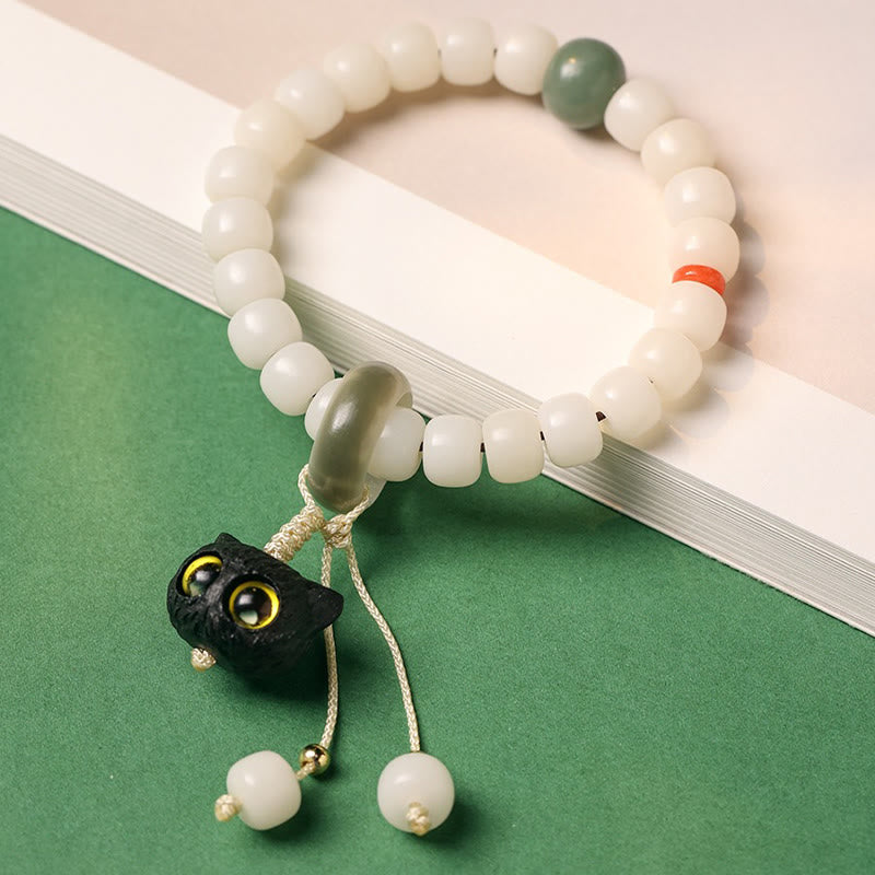 Weißes Bodhi Armband mit schwarzer Katze Anhänger Liebe Frieden