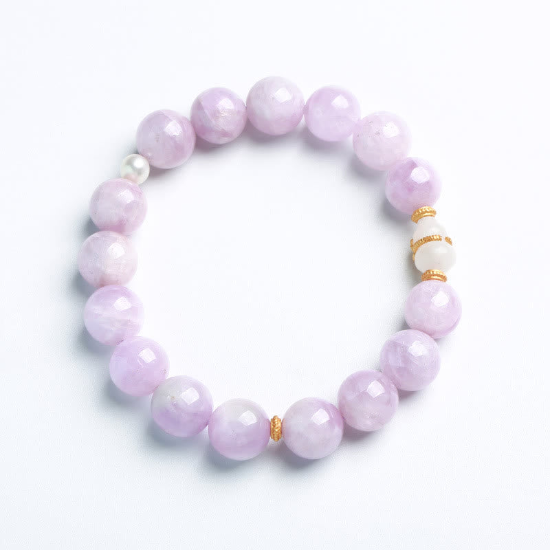 Lavendel Jade Armband mit Perlen und Goldakzenten elegant.