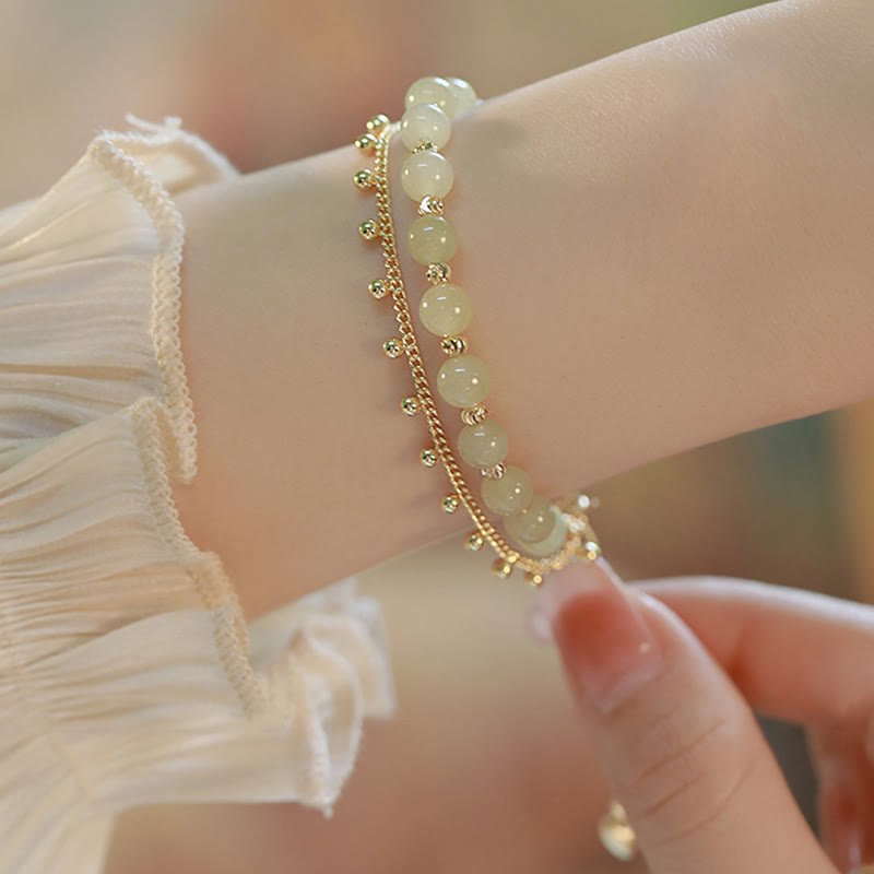 Jade Armband Glück Wohlstand Harmonie goldfarben Perlen Handgelenk elegant getragen