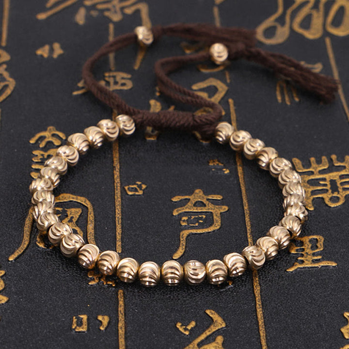 Armband Kupfer Glück Balance mit silbernen Perlen braun elastisch.