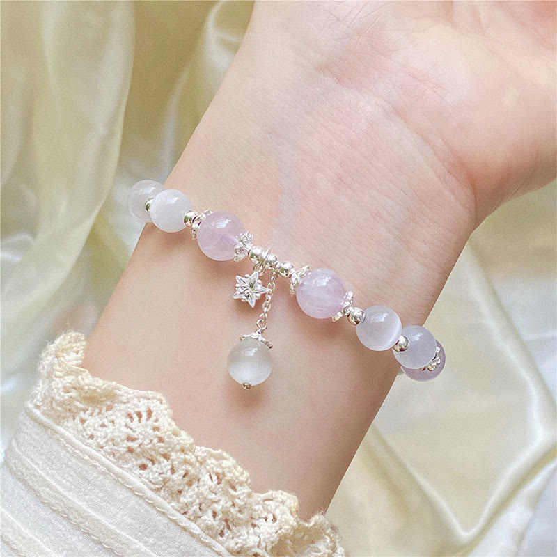 Amethyst Armband 925 Silber Stern Charm am Handgelenk getragen