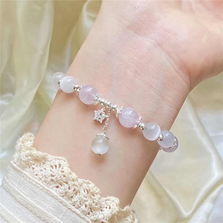 Amethyst Armband 925 Silber Stern Charm am Handgelenk getragen