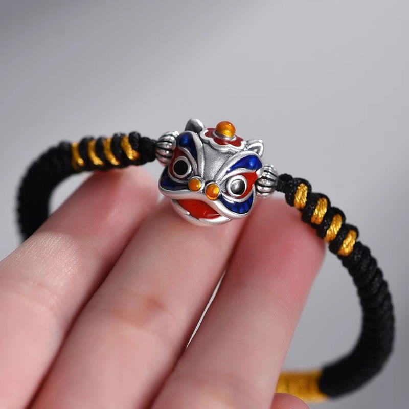 Armband Tanzendes Löwe Glück Geflochten schwarzes Band golden gestreift