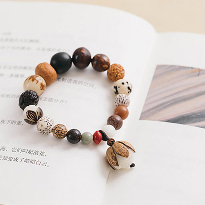 Bodhi Lotus Armband mit Natursteinen und Holzperlen elegant.