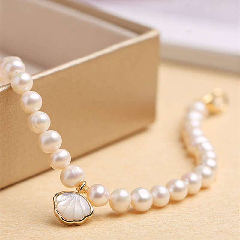 Elegantes Perlenarmband mit Muschelanhänger goldenes Armband Kristall Perle.