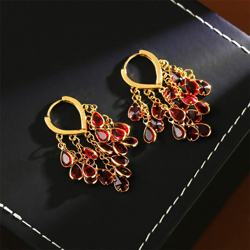 Ohrringe Kupfer Tropfen Quaste rote Kristalle Boho Schmuck eleganter Ohrhänger