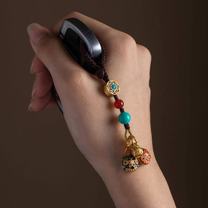 Schlüsselanhänger Goldschluckbestie Cloisonné Perlen Feng Shui Glücksbringer Wohlstand spirituell