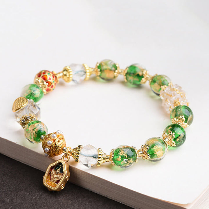 Grünes Glasperlen Armband 925 Silber Kupfer mit goldenem Buddha Anhänger