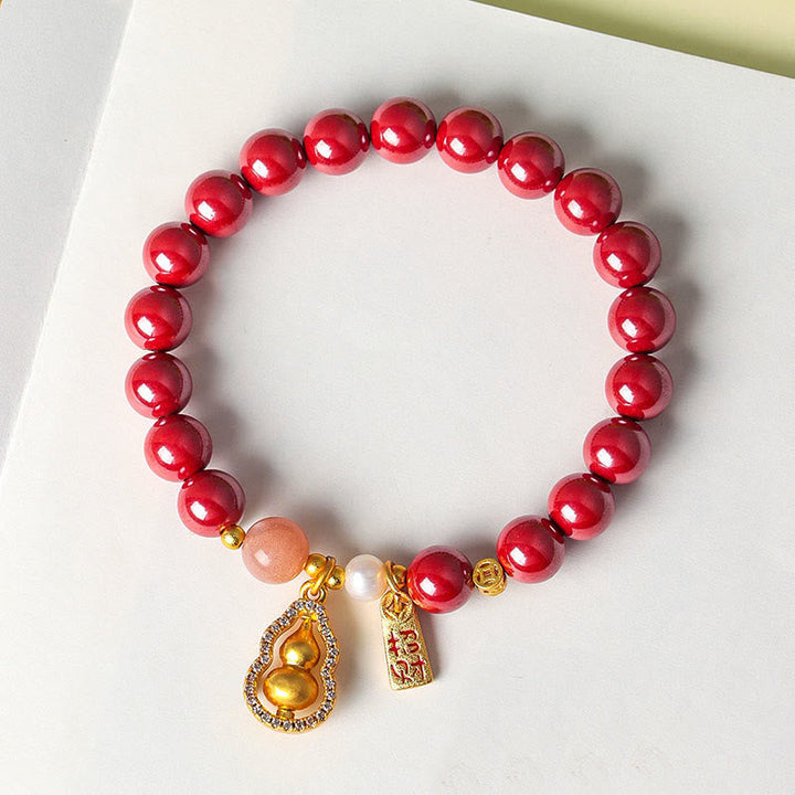 Armband Zinnober – Segen & Glück mit Kürbis Anhänger rote Perlen