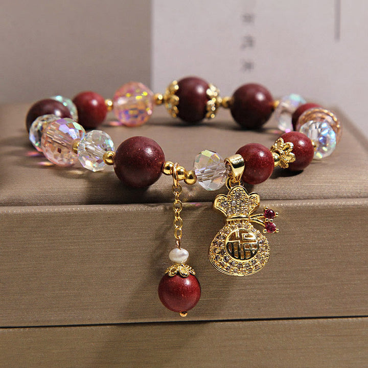 Armband Sandelholz Fu-Zeichen Schutz Glück Kristallperlen goldener Glücksbeutel Anhänger