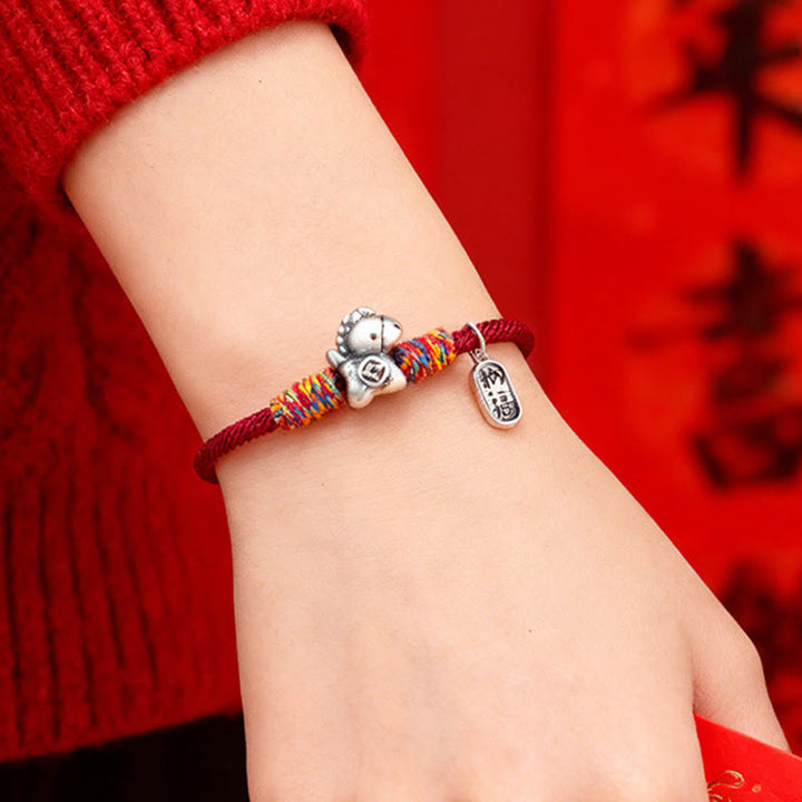 Armband Silber 999 Pferd-Motiv Fu-Zeichen Glück Wohlstand am Handgelenk getragen