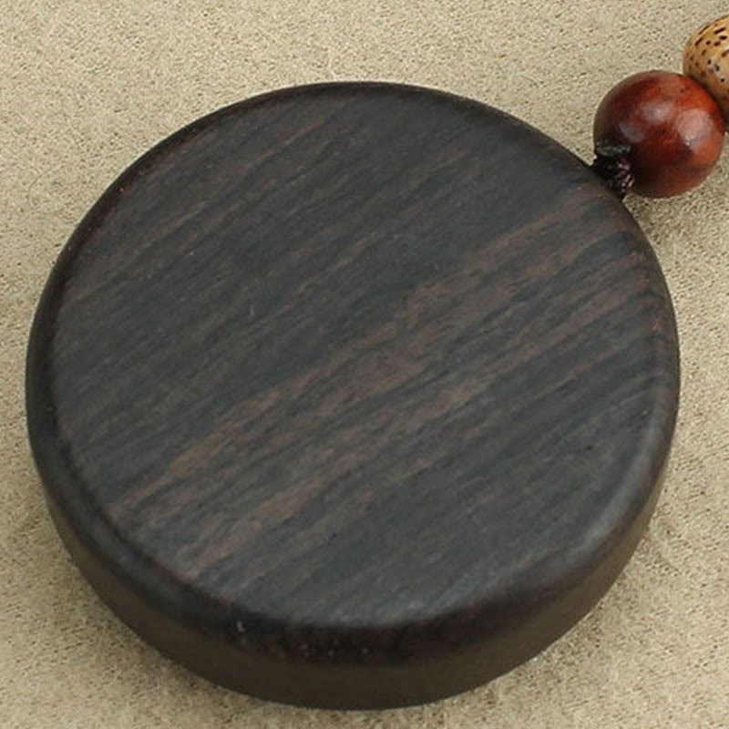 Schlüsselanhänger Münze Ebenholz – Glück & Wohlstand Holzdetail spirituell
