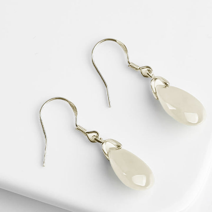 Ohrringe Jade Tropfen Glück Wohlstand Silber weiße Tropfenform Schmuck spirituell