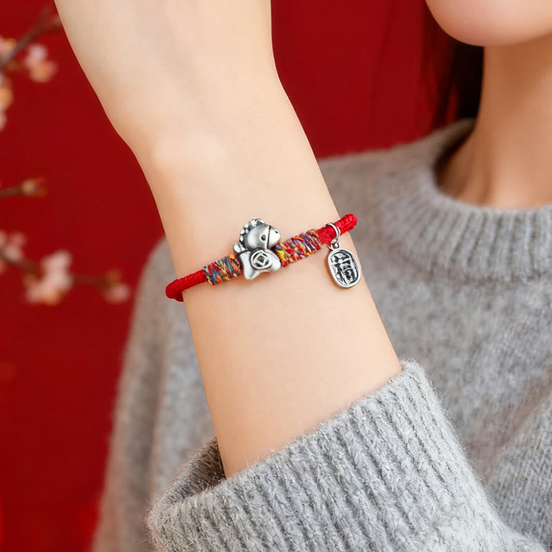 Armband Silber 999 Pferd-Motiv Fu-Zeichen Glück Wohlstand am Handgelenk getragen