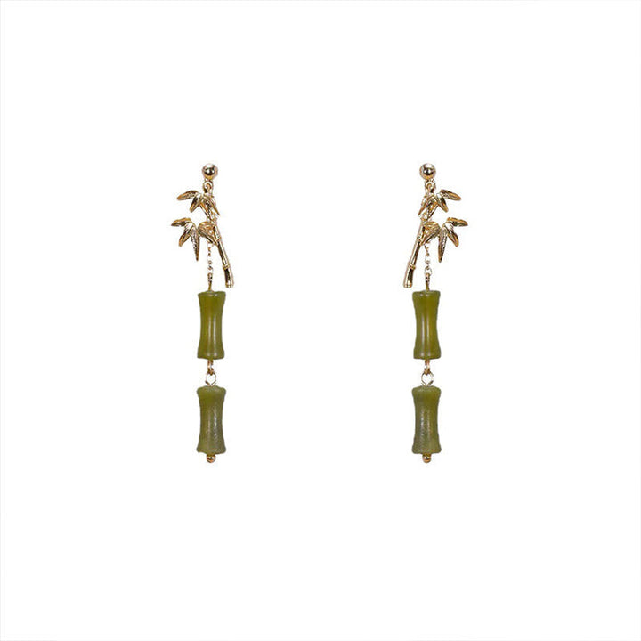 Ohrringe Peridot Bambus Glück Wachstum grüne Steine goldene Bambusblätter Boho Schmuck