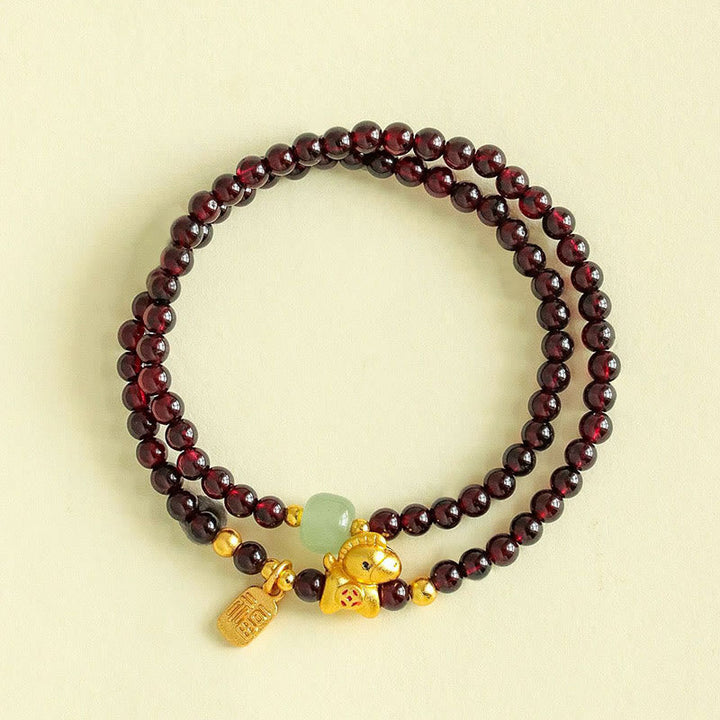Armband Granat Jade Fu-Zeichen Stabilität goldener Ochse Anhänger Glück