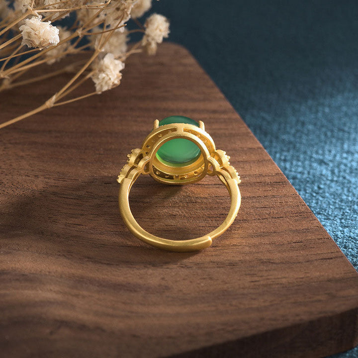 Grüner Jade Ring mit goldenem Pixiu Feng Shui Symbol für Wohlstand und Glück