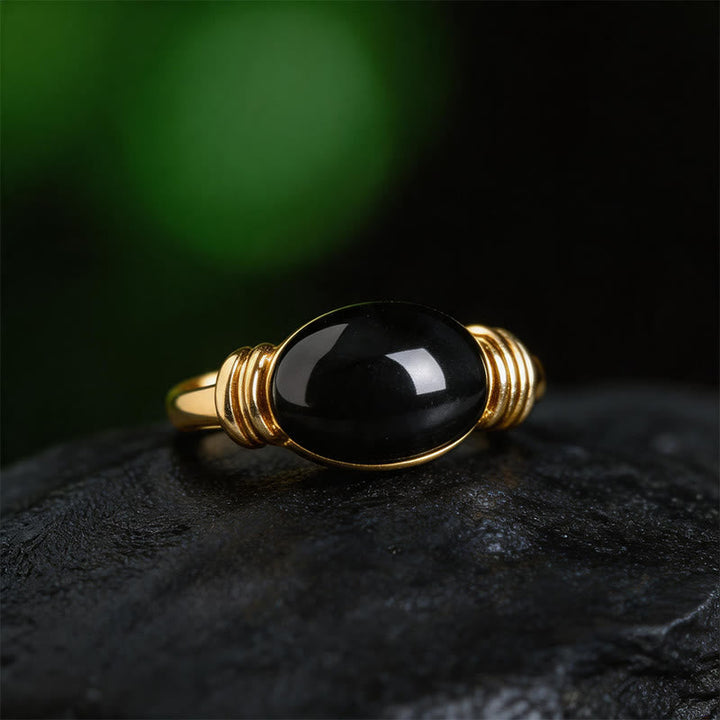 Ring Hämatit Ovalmuster Kupferband golden Fengshui Glück Schutzstein