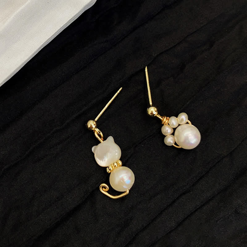 Ohrringe Perle Katzenpfote Gold asymmetrisch Boho Schmuck spirituell Ohrhänger
