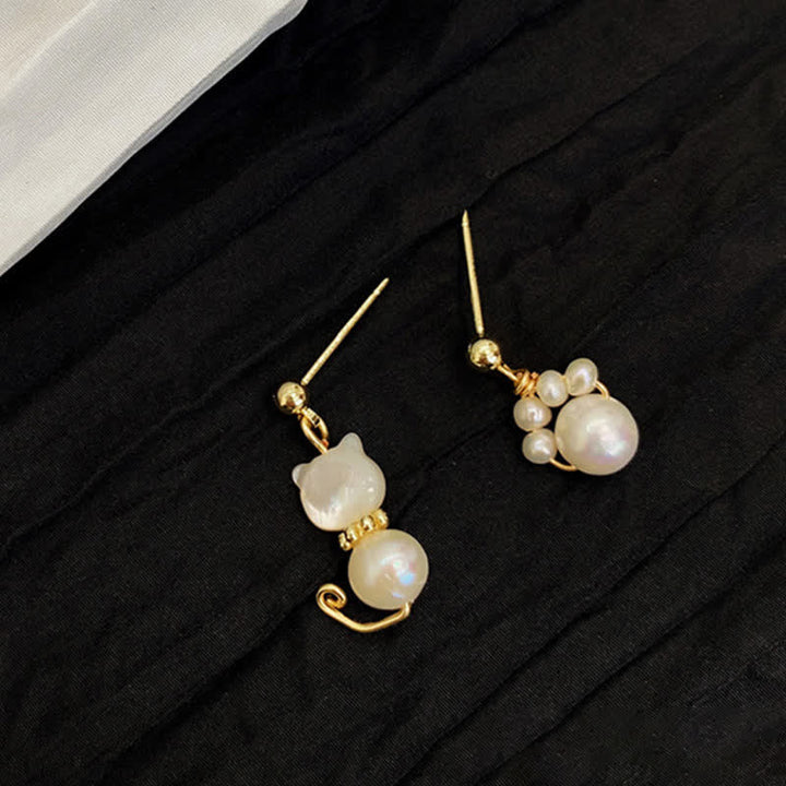 Ohrringe Perle Katzenpfote Gold asymmetrisch Boho Schmuck spirituell Ohrhänger