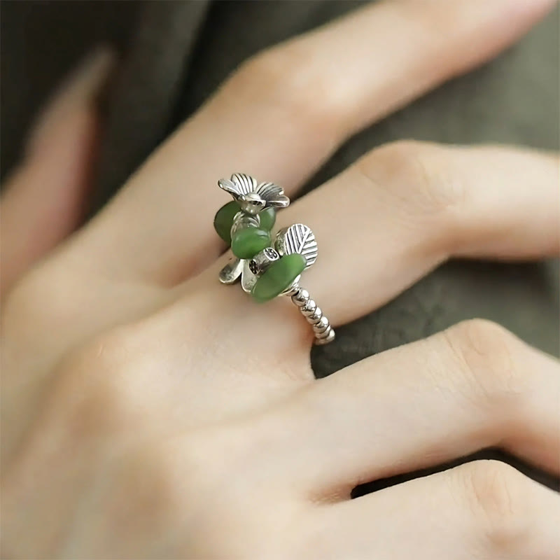 Ring Kupfer Blumenmuster grüne Steine getragen Glück Fengshui Schutz