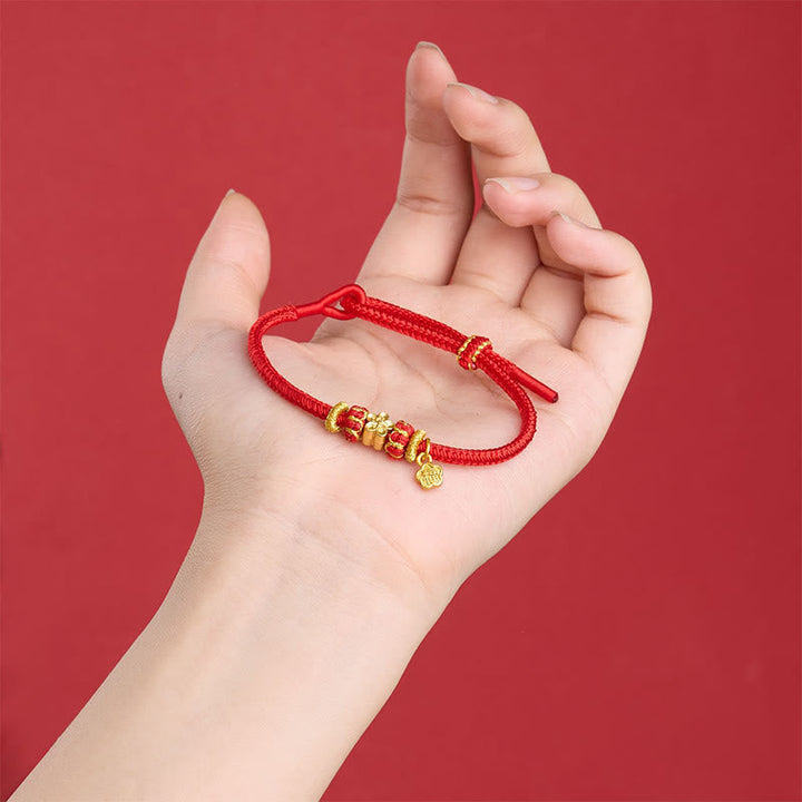 Rotes Armband Kupfer Om Mani Padme Hum Glück Energie auf Hand