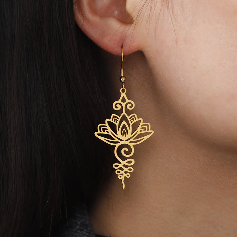 Lotus Ohrringe Edelstahl gold getragen Boho Schmuck spirituell Ohrhänger