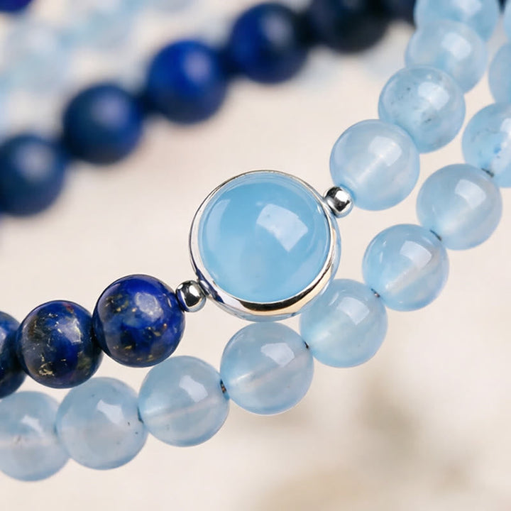 Armband Lapislazuli Aquamarin – Heilung mit silbernem Anhänger Nahaufnahme blaue Perlen