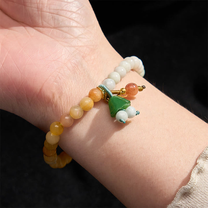 Armband Jade Lotus Glück Frieden Energie getragen Handgelenk Perlen bunt