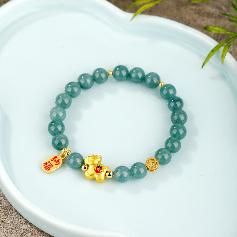 Armband Jade – Fülle & Wohlstand grüne Perlen goldener Anhänger Handgelenk