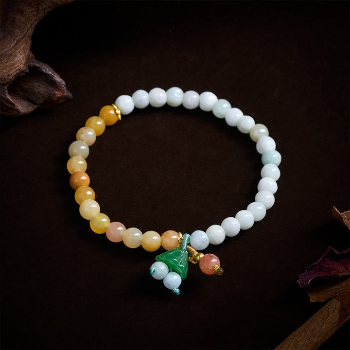 Armband Jade Lotus Glück Frieden Energie Perlen grüner Anhänger Holz