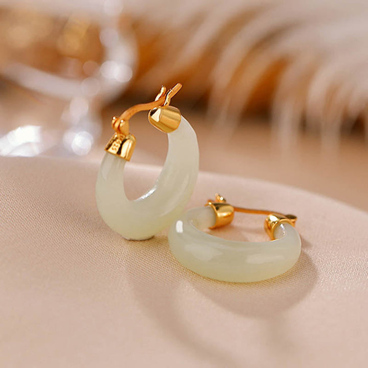 Jade Ohrringe Gold Creolen elegant Boho Schmuck spirituell Wohlstand