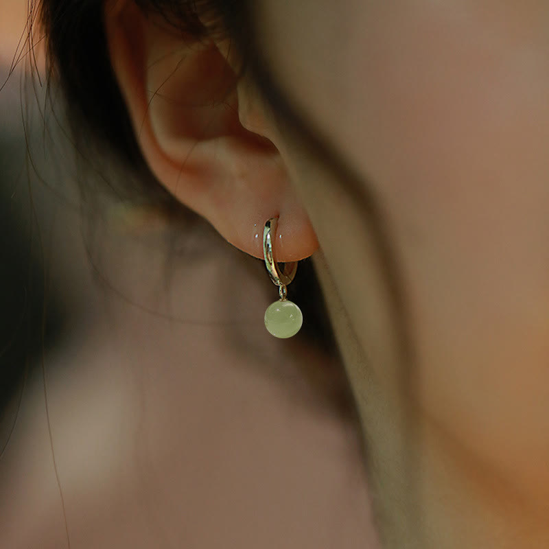 Jade Ohrringe Wohlstand getragen Gold Creolen Boho Schmuck spirituell