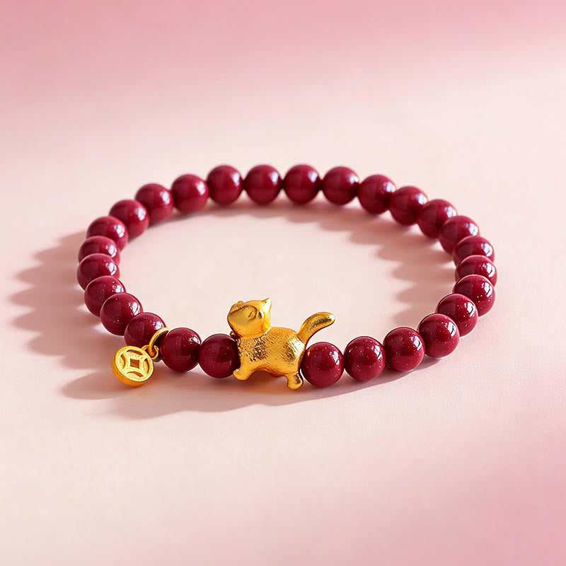 Armband Zinnober Granat Katze Schutz Glück goldene Katze Münze Perlen