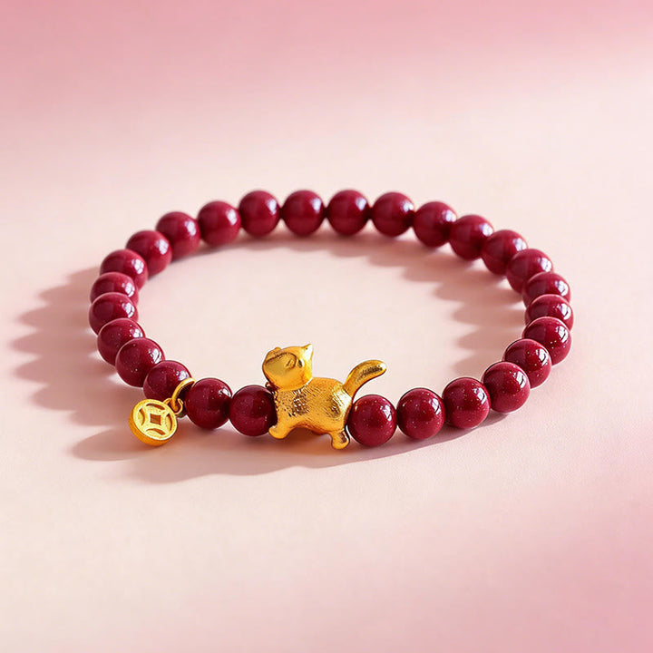 Armband Zinnober Granat Katze Schutz Glück goldene Katze Münze Perlen
