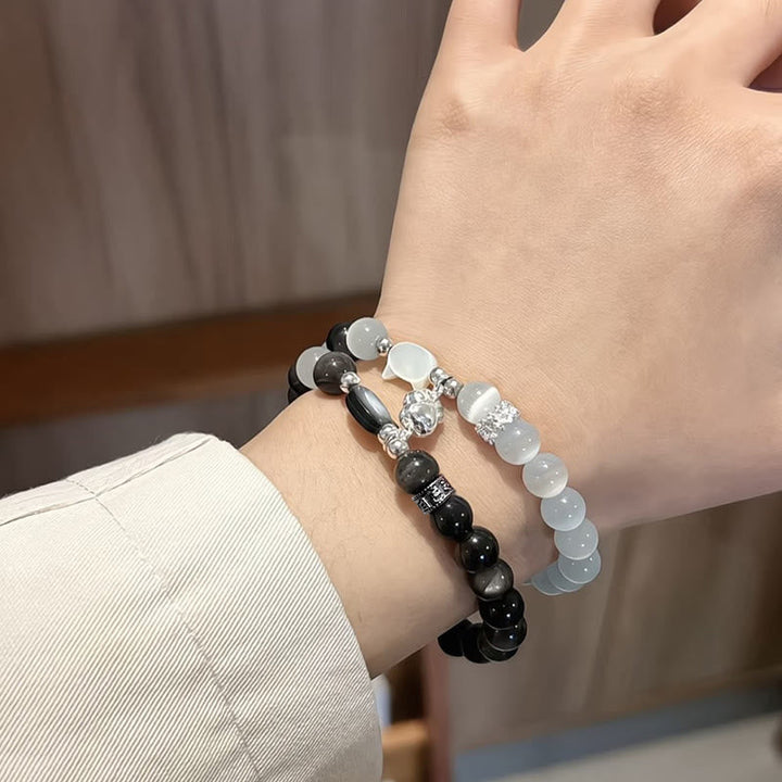 Armband Silber Obsidian Katze Positivität Partnerarmband am Handgelenk getragen