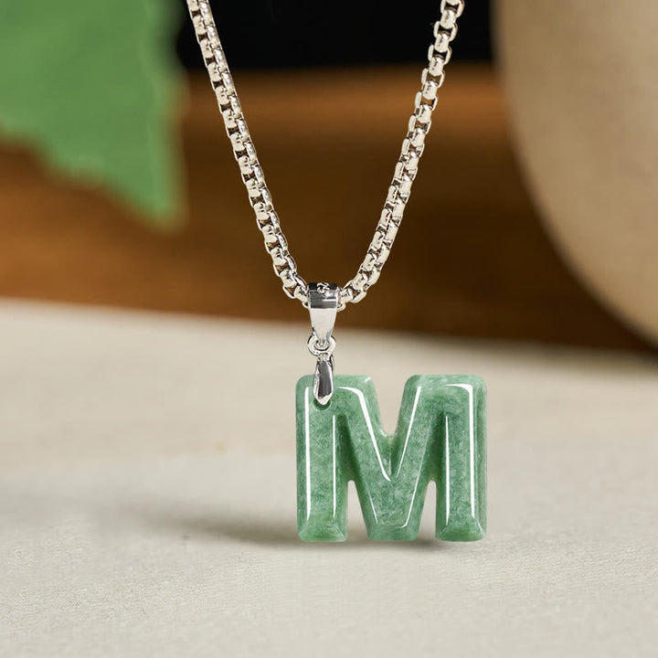 Kette Jade Buchstabe Titanstahl Natur – Wohlstand M