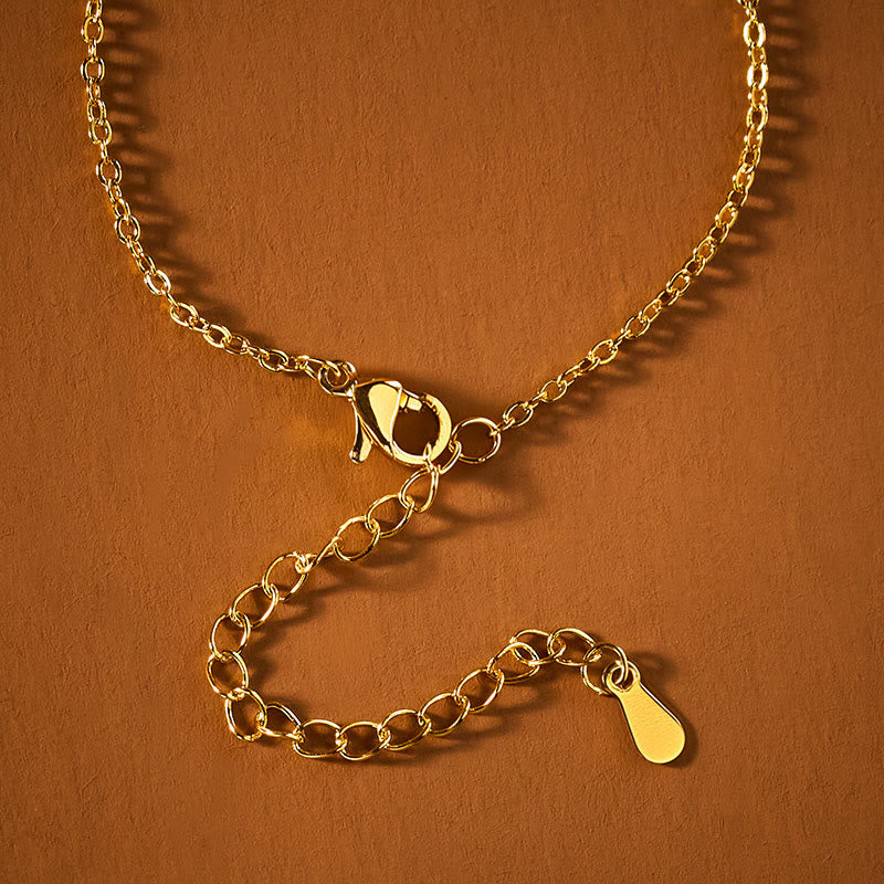 Goldkette Lotus Schließe Frieden eleganter Anhänger hochwertiger Schmuck glänzend