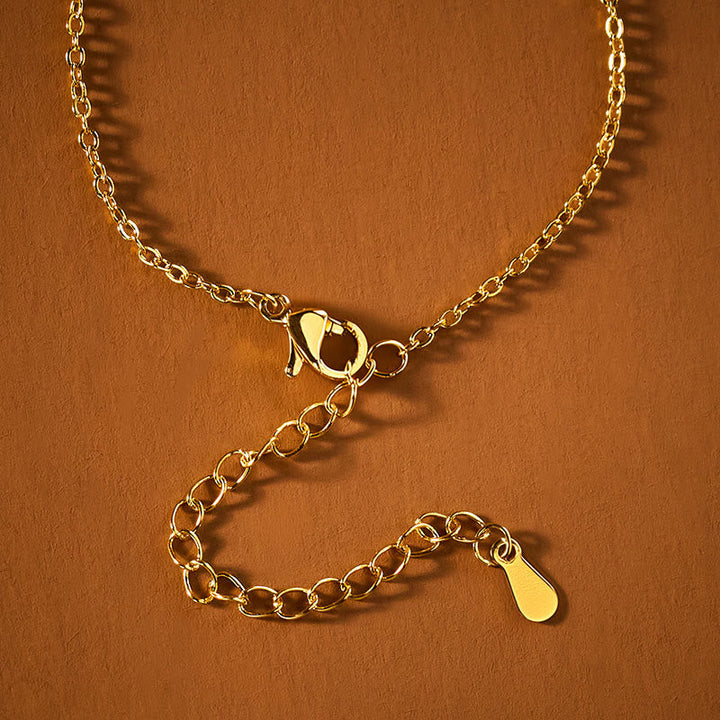 Goldkette Lotus Schließe Frieden eleganter Anhänger hochwertiger Schmuck glänzend