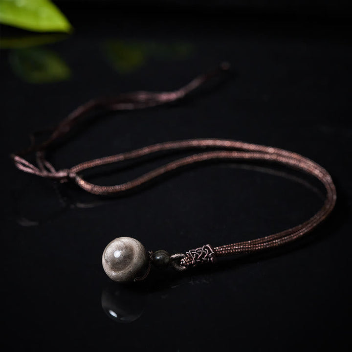 Schwarze Kette mit Obsidian Regenbogen Anhänger eleganter Naturstein Schmuck