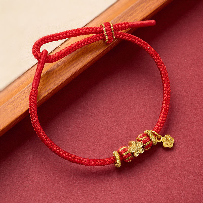 Rotes geflochtenes Armband mit goldenen Perlen Glück Energie Schutz Handgelenk