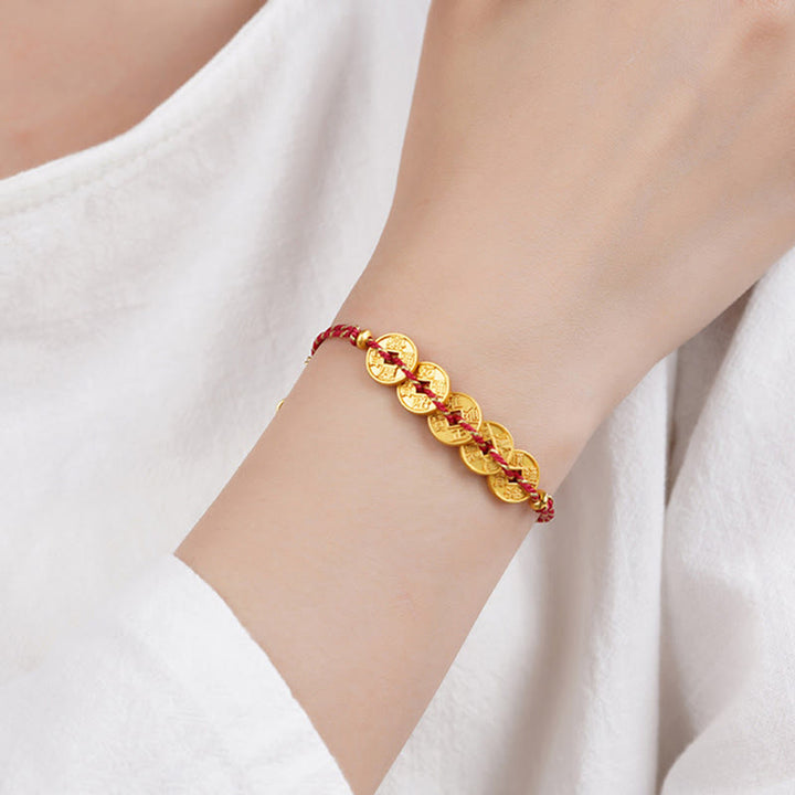 Armband Kupfer Fünf Kaiser Balance rotes Band am Handgelenk getragen