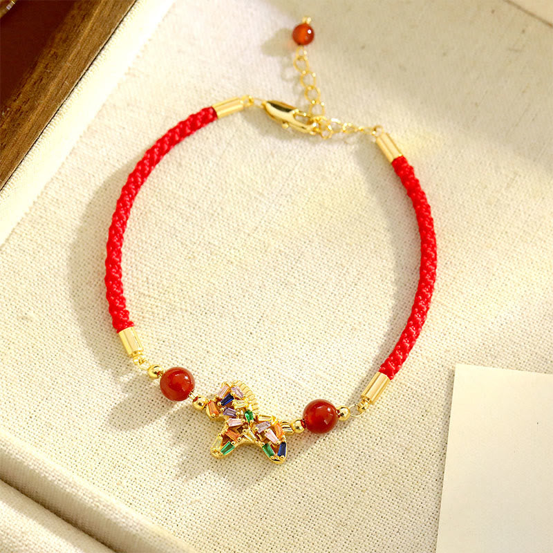 Armband Roter Achat Kupfer Balance mit goldenem Pferd Anhänger und rotem Band