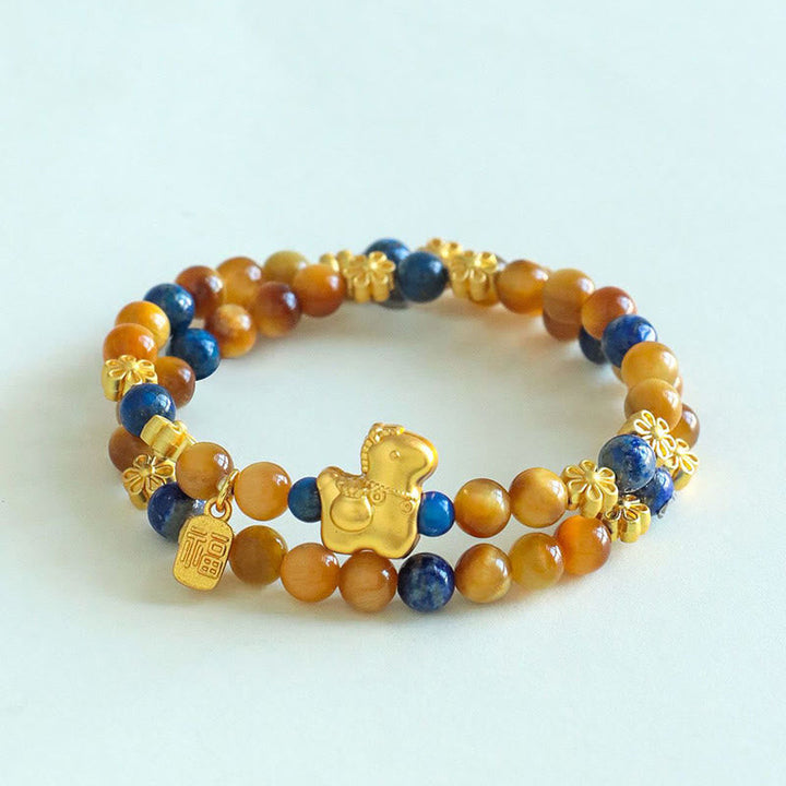 Armband Lapislazuli Tigerauge Fu-Zeichen goldenes Pferd Glücksbringer Perlen