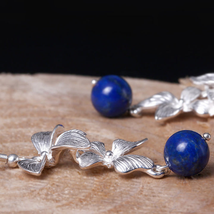 Ohrringe Silber Lapislazuli Blume Nahaufnahme Holz Boho Schmuck spirituell
