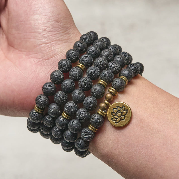Armband Lavastein Lotus Heilung getragen am Handgelenk Schutz Energie Meditation