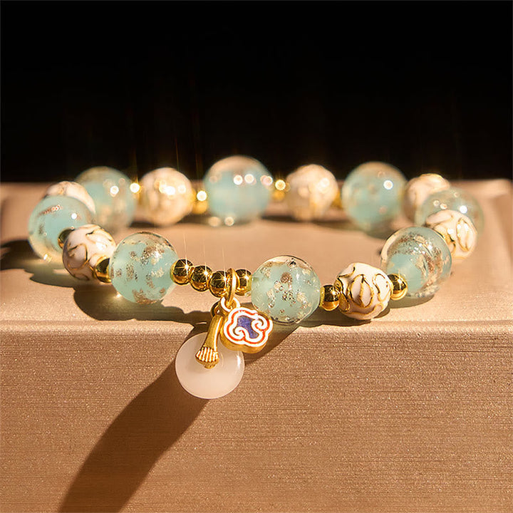 Armband Liuli – Segen Energie mit Jade Anhänger und Lotus Perlen