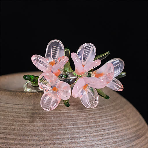 Ring Liuli Birnblüte Weisheit rosa transparente Blüten grüne Blätter Kristall