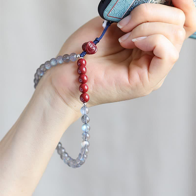 Schlüsselanhänger Mondstein Zinnober Perlen Handgelenk Glücksbringer spirituell Schmuck