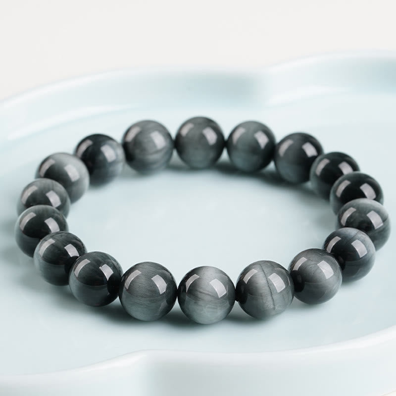 Armband Adlerauge Energie Ruhe graue Perlen Edelstein Schmuck Schale